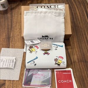 Coach White Wallet with Peanuts Gang Graphics NWT and NIB